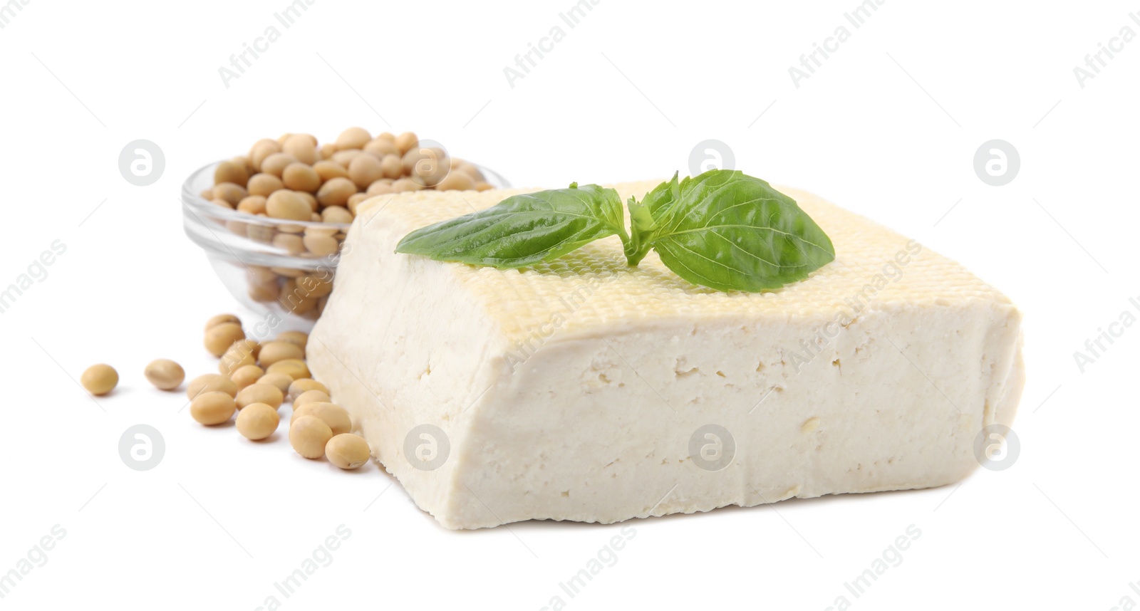 Photo of Delicious tofu cheese, basil and soybeans isolated on white