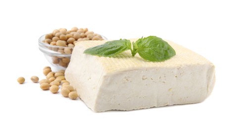 Photo of Delicious tofu cheese, basil and soybeans isolated on white