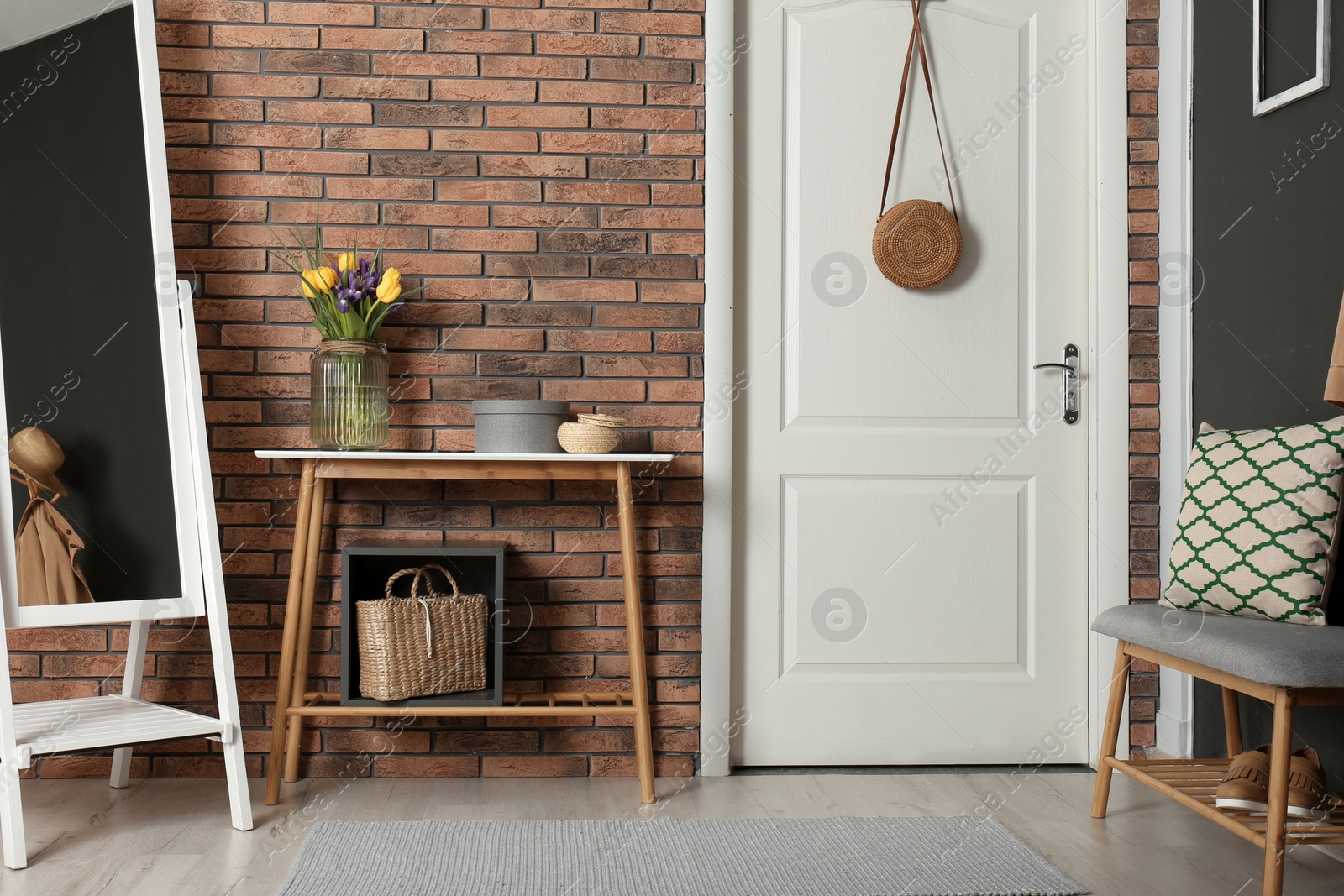 Photo of Hallway interior with stylish table and mirror