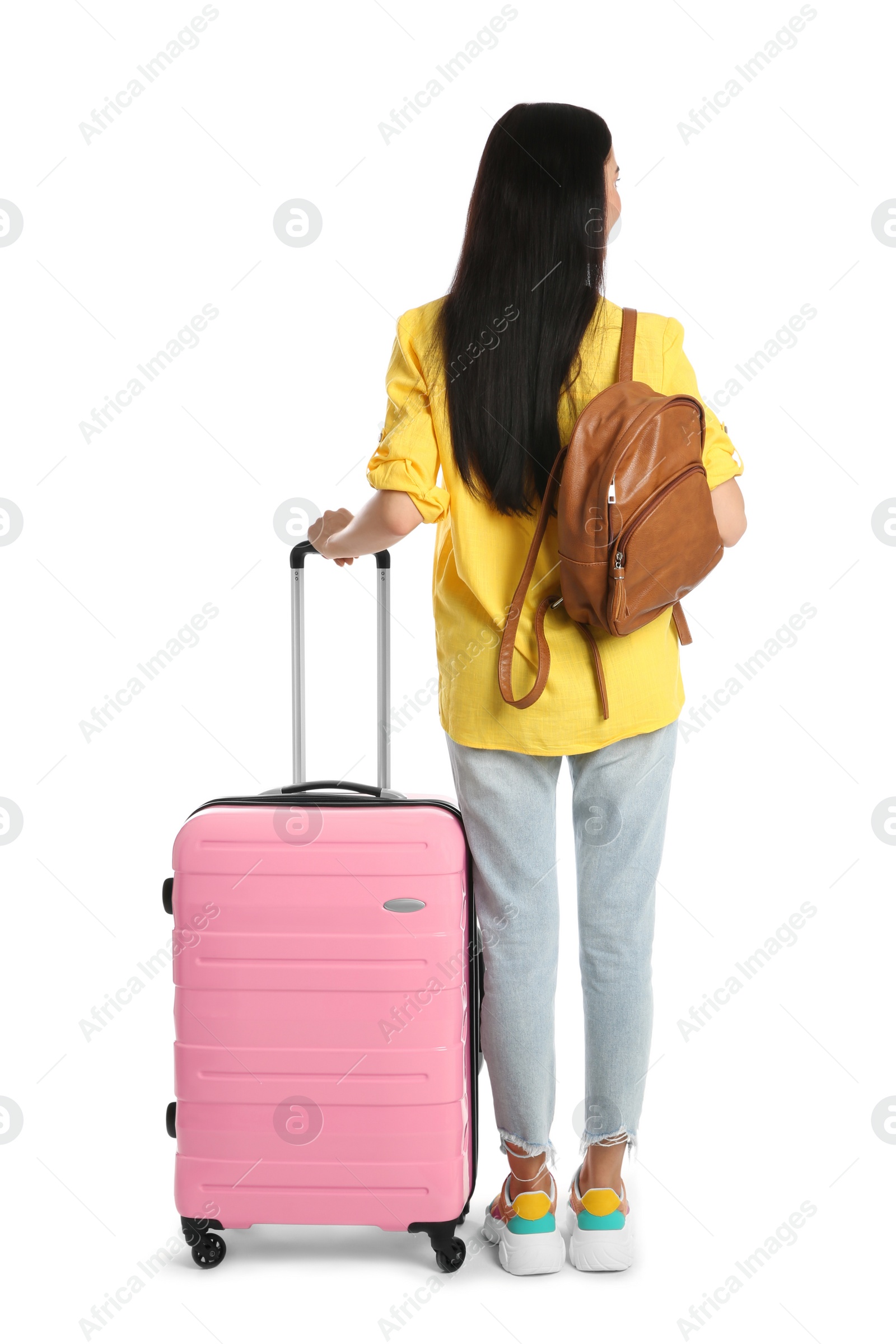 Photo of Beautiful woman with suitcase and backpack for summer trip on white background, back view. Vacation travel