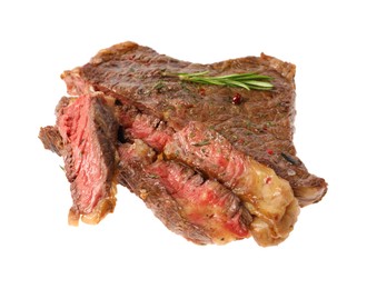 Photo of Delicious grilled beef steak with spices isolated on white