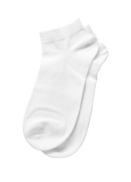 Photo of Pair of socks isolated on white, top view