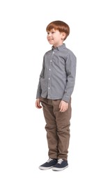 Photo of Little boy in shirt and pants on white background