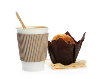 Photo of Cardboard cup of coffee and tasty muffin on white background