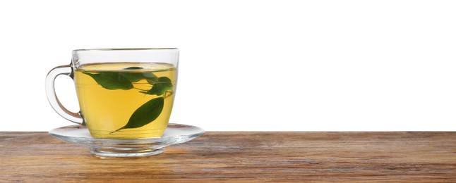 Photo of Refreshing green tea in cup on wooden table against white background