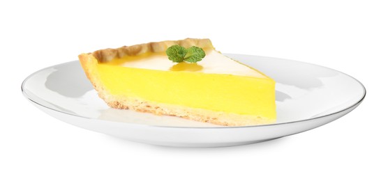 Plate with slice of delicious homemade lemon pie on white background