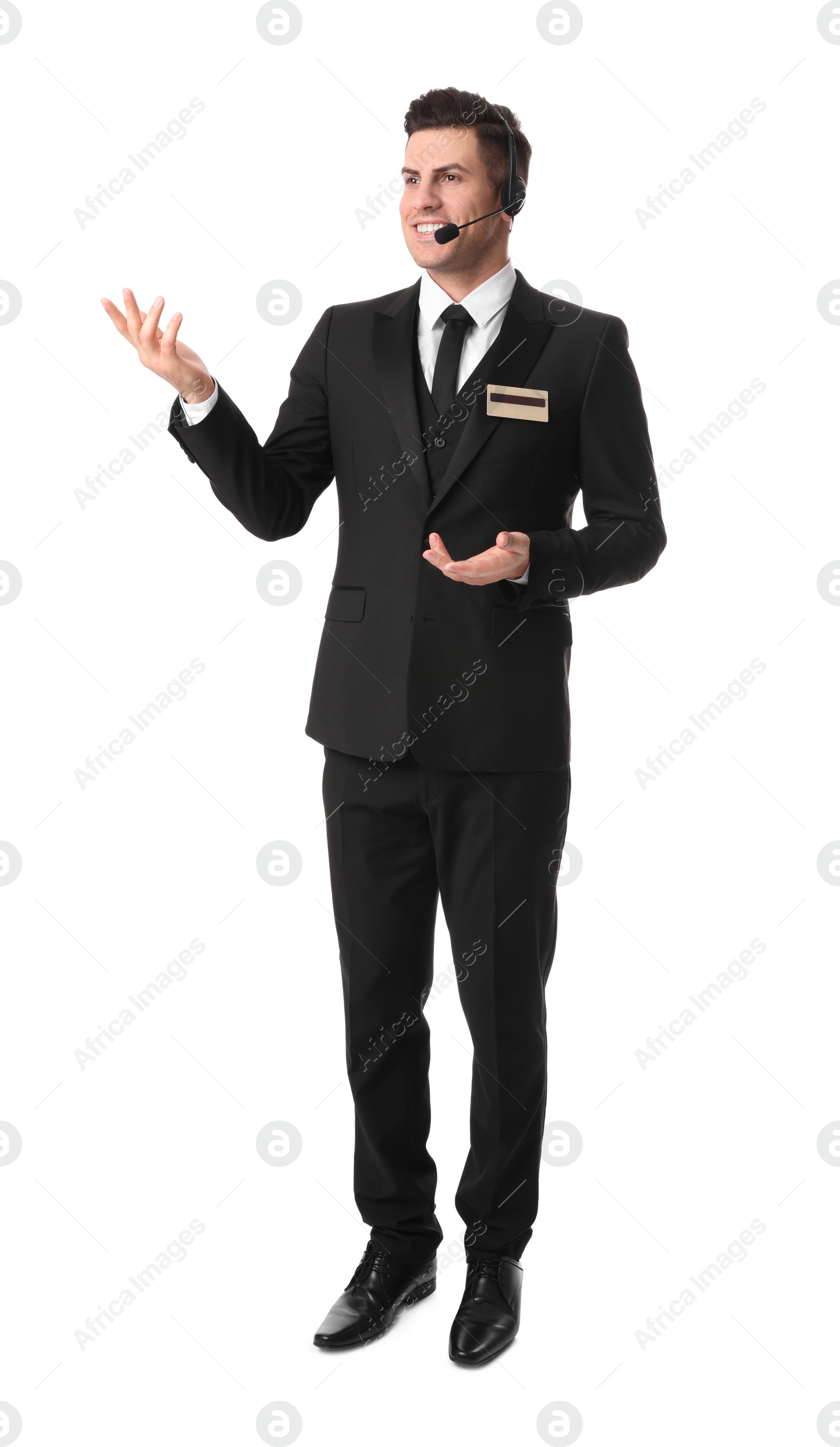 Photo of Full length portrait of receptionist with headset on white background