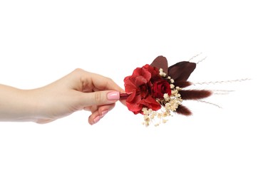 Photo of Woman holding stylish boutonniere on white background, closeup