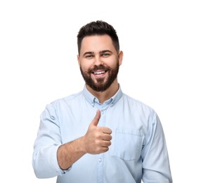 Happy young man with mustache showing thumb up on white background