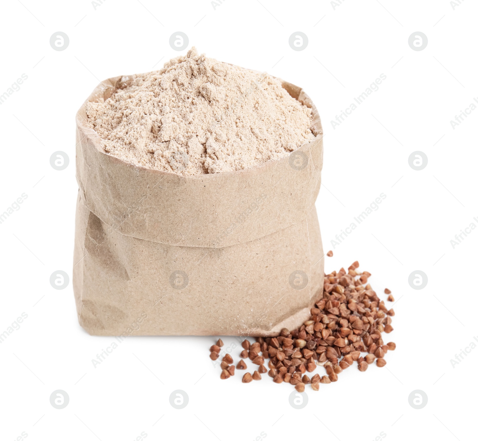 Photo of Paper bag with buckwheat flour and grains isolated on white