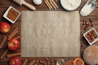 Photo of Flat lay composition with rye dough and ingredients on wooden background