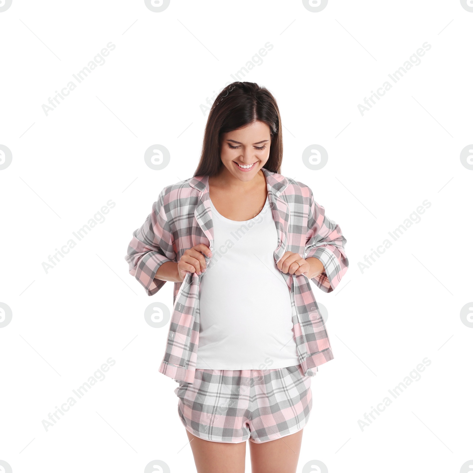 Photo of Happy pregnant woman posing on white background