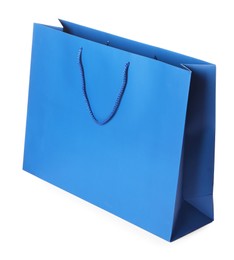 Photo of One blue shopping bag isolated on white