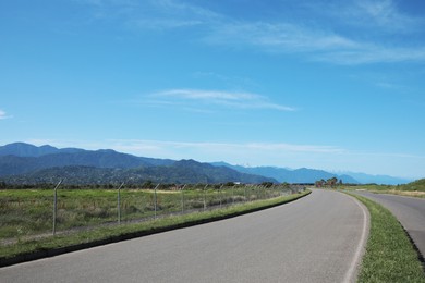 Photo of Beautiful view of mountains and empty asphalt road