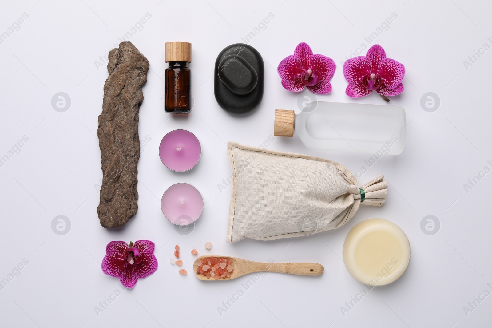 Photo of Flat lay composition with different spa products on white background