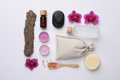 Photo of Flat lay composition with different spa products on white background