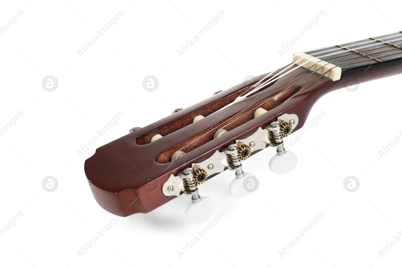 Photo of Acoustic guitar on white background, closeup. Musical instrument