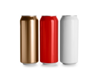 Photo of Aluminum cans with drinks on white background