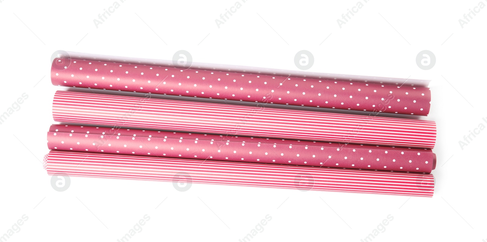 Photo of Different colorful wrapping paper rolls on white background, top view