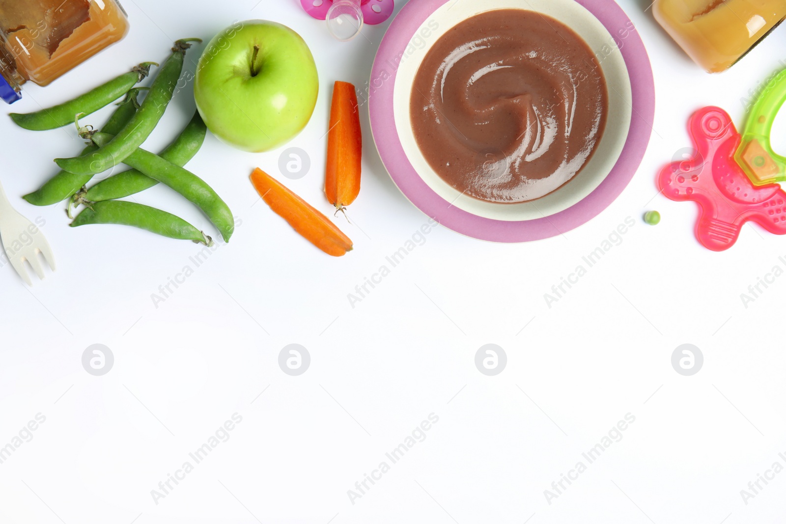 Photo of Flat lay composition with healthy baby food, ingredients and accessories on white background. Space for text