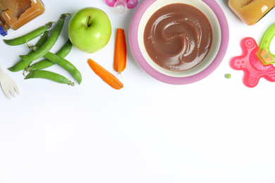 Photo of Flat lay composition with healthy baby food, ingredients and accessories on white background. Space for text