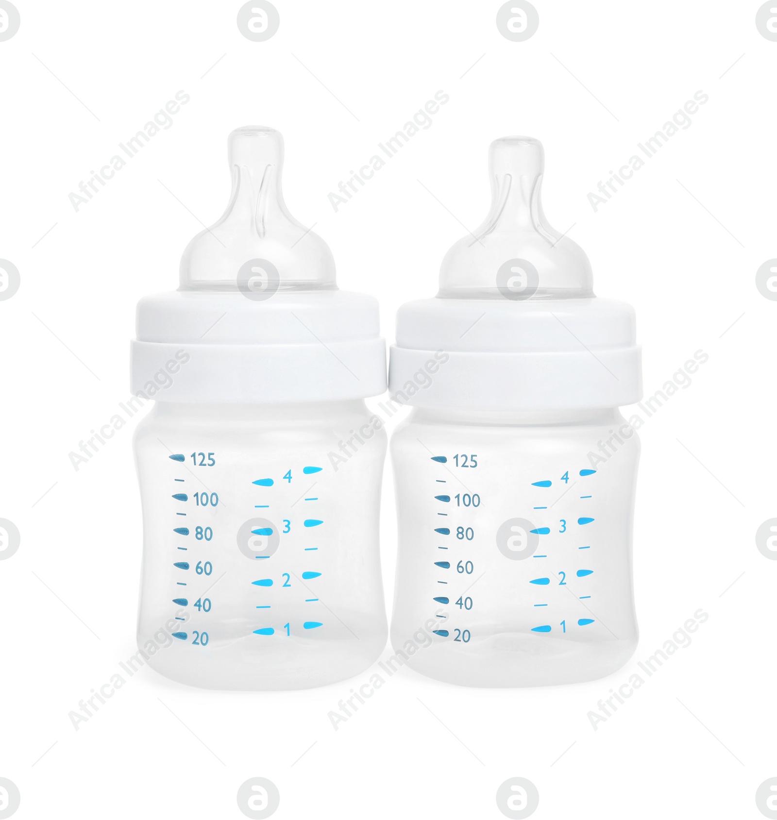 Photo of Two empty feeding bottles for infant formula on white background