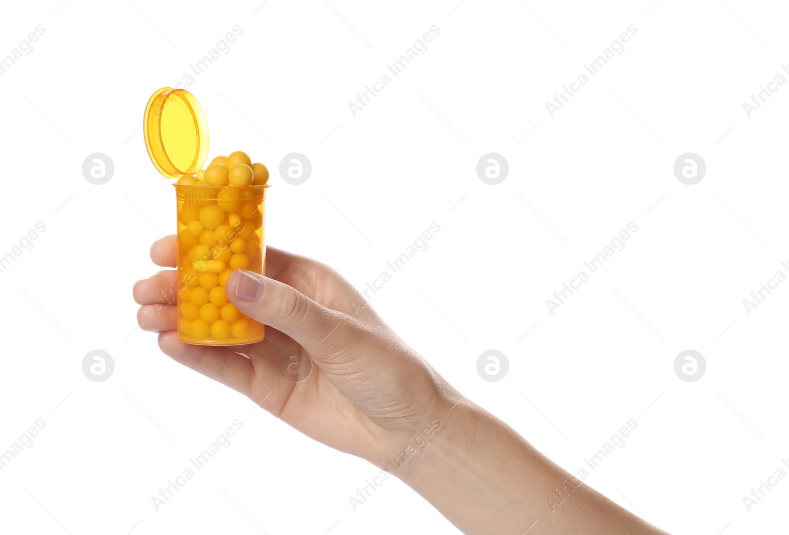 Photo of Woman holding bottle of pills on white background, closeup