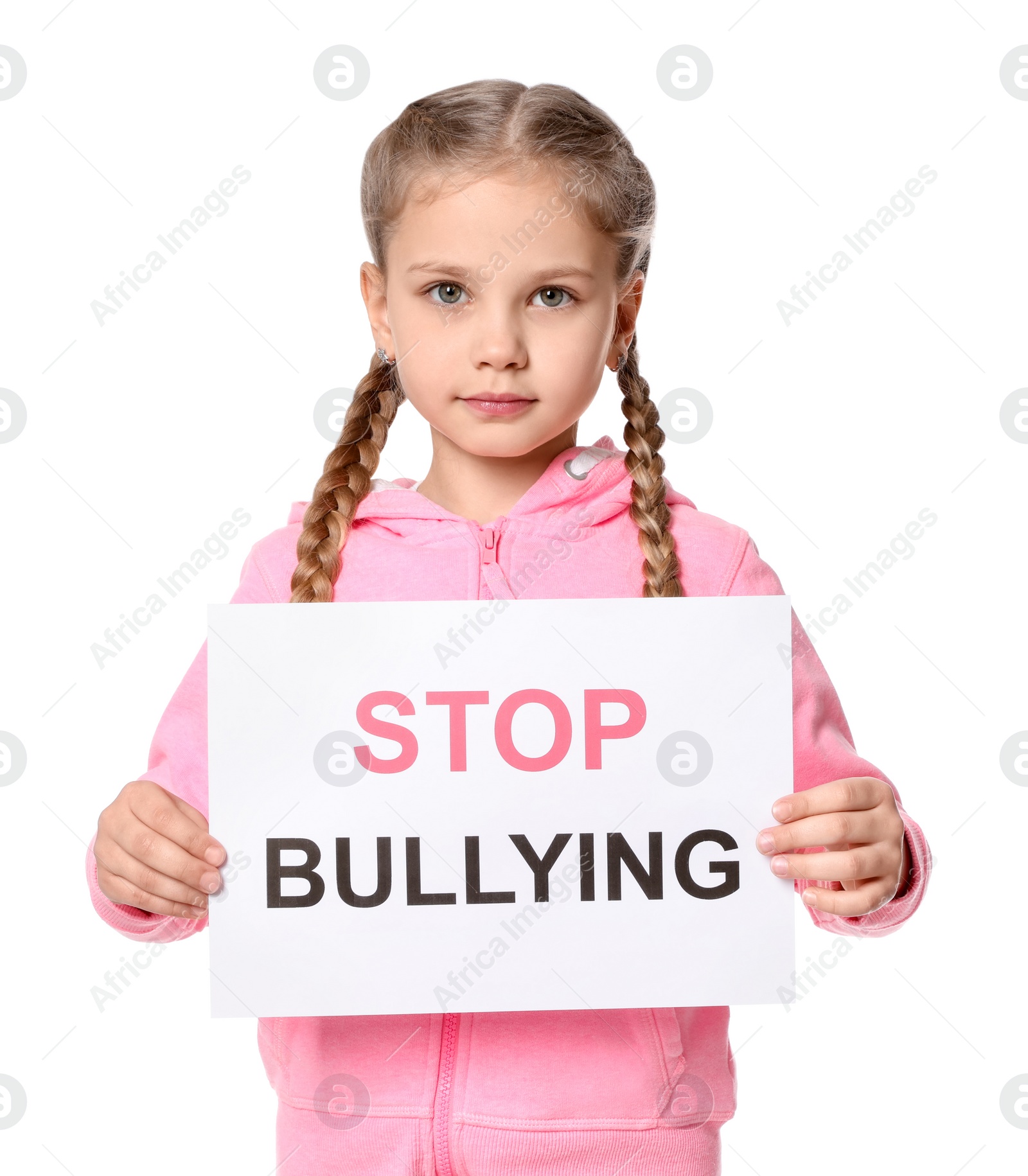 Photo of Girl holding sign with phrase Stop Bullying on white background