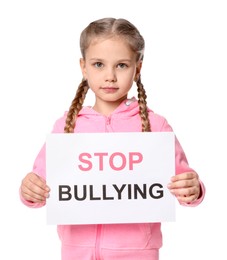 Photo of Girl holding sign with phrase Stop Bullying on white background