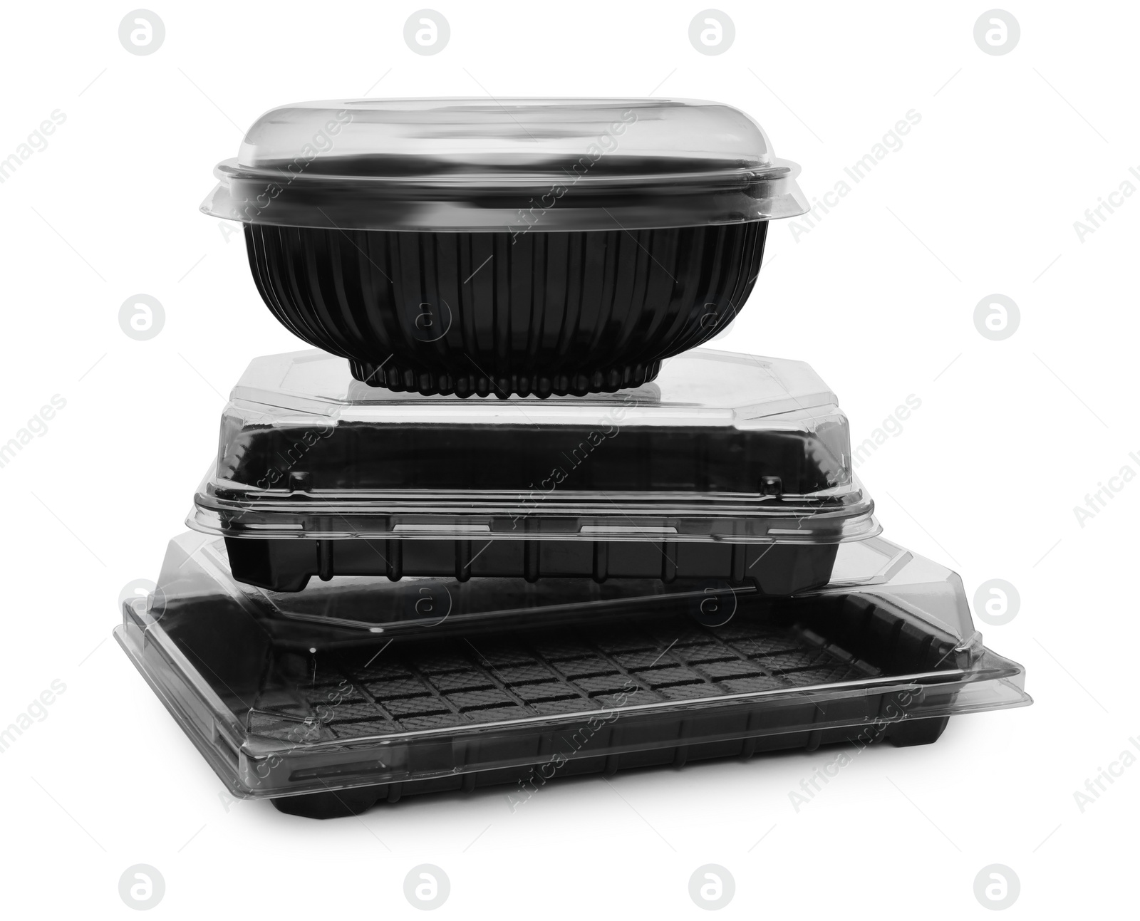 Photo of Plastic containers and bowl for food on white background