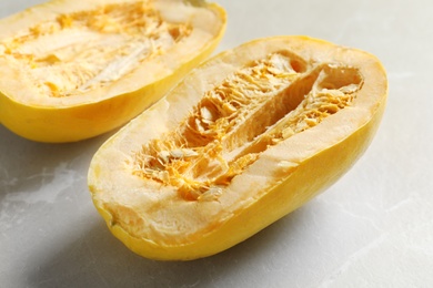 Raw cut spaghetti squash on gray table