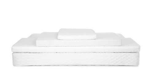 Modern comfortable orthopedic mattress pile isolated on white