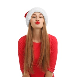 Photo of Young beautiful woman in Santa hat on white background. Christmas celebration