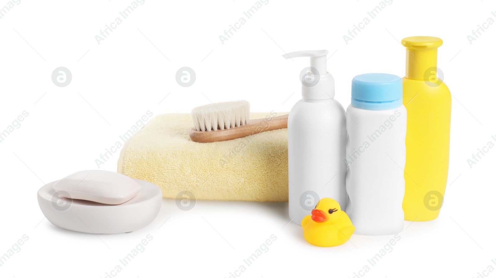 Photo of Baby cosmetic products, bath duck, brush and towel isolated on white