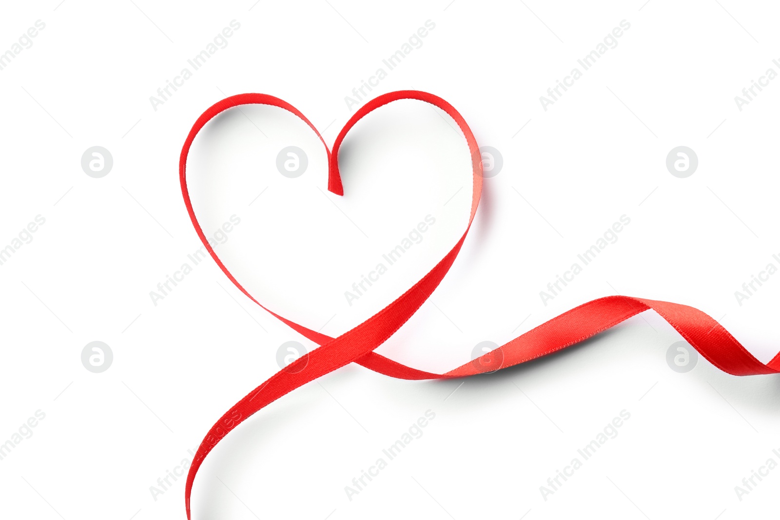 Photo of Heart made of red ribbon on white background, top view. Festive decoration