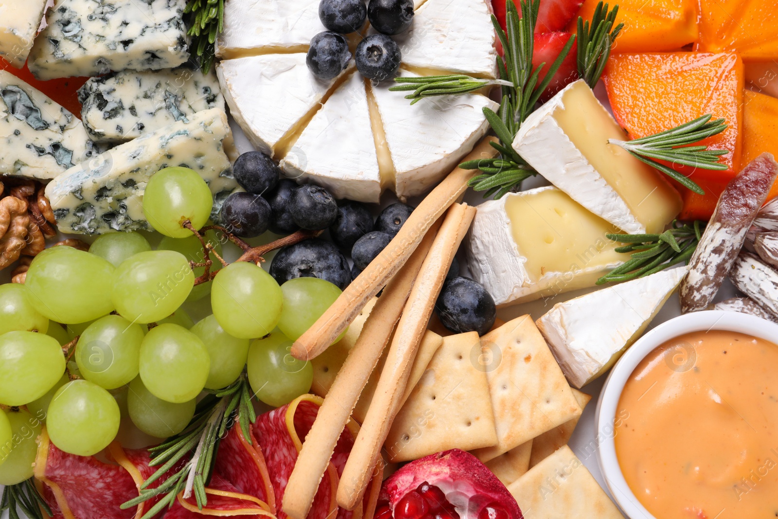 Photo of Tasty assorted appetizers as background, top view