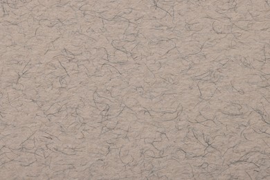 Texture of light grey paper sheet as background, top view