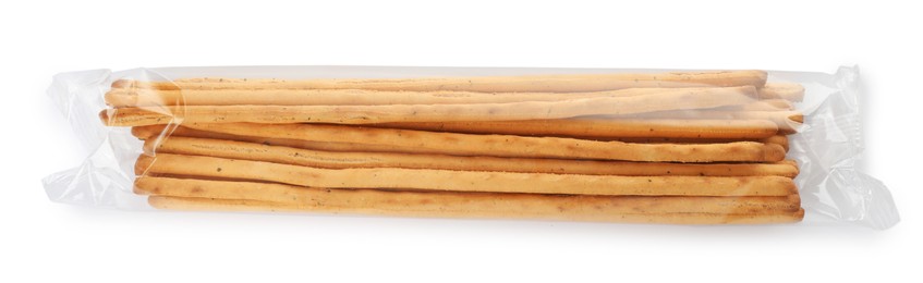 Delicious grissini sticks on white background, top view