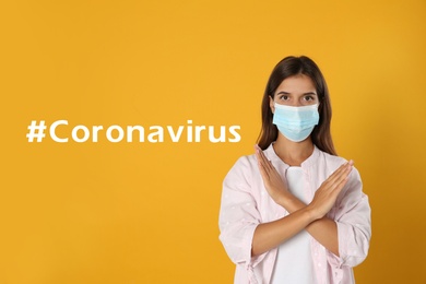 Image of Young woman in protective mask showing stop gesture near hashtag Coronavirus on yellow background
