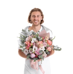 Young handsome man with beautiful flower bouquet on white background