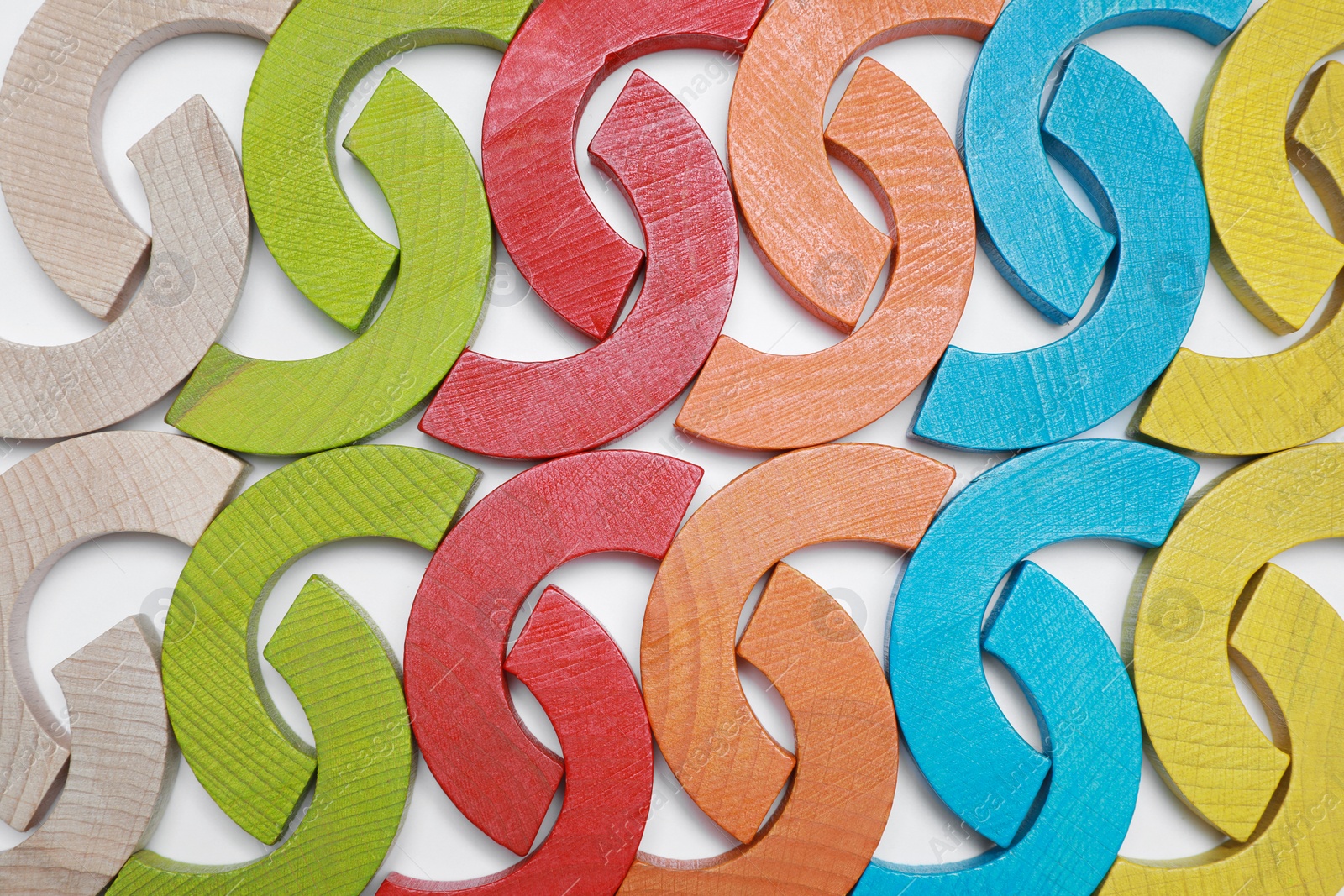 Photo of Colorful wooden pieces of play set on white background, flat lay. Educational toy for motor skills development