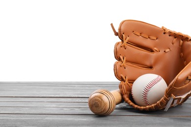 Baseball bat, ball and catcher's mitt on grey wooden table against white background