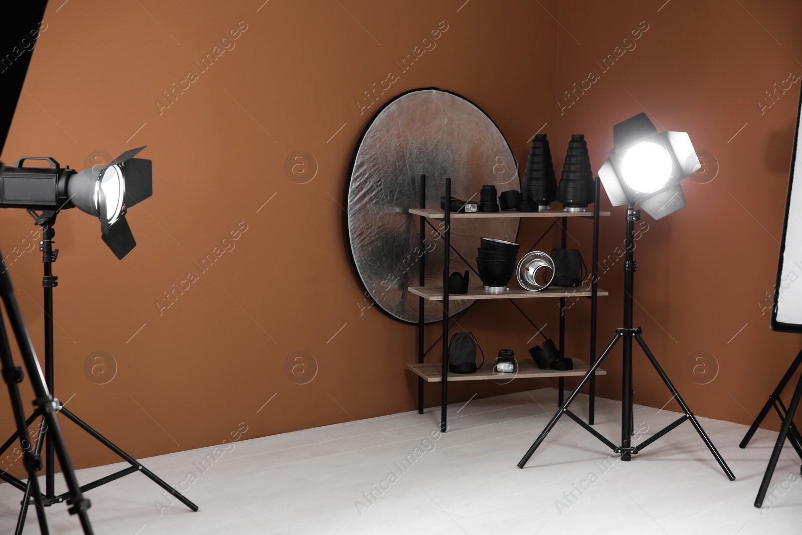 Photo of Interior of modern photo studio with professional equipment