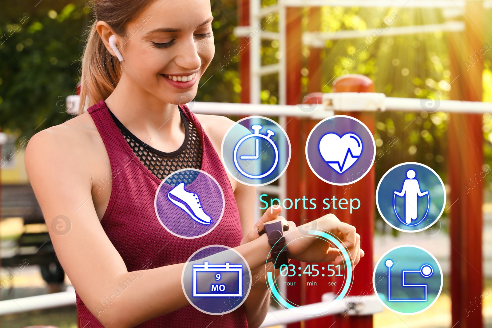 Image of Woman using smart watch during training outdoors. Icons near hand with device