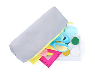 Photo of Many different school stationery in pencil case isolated on white, top view