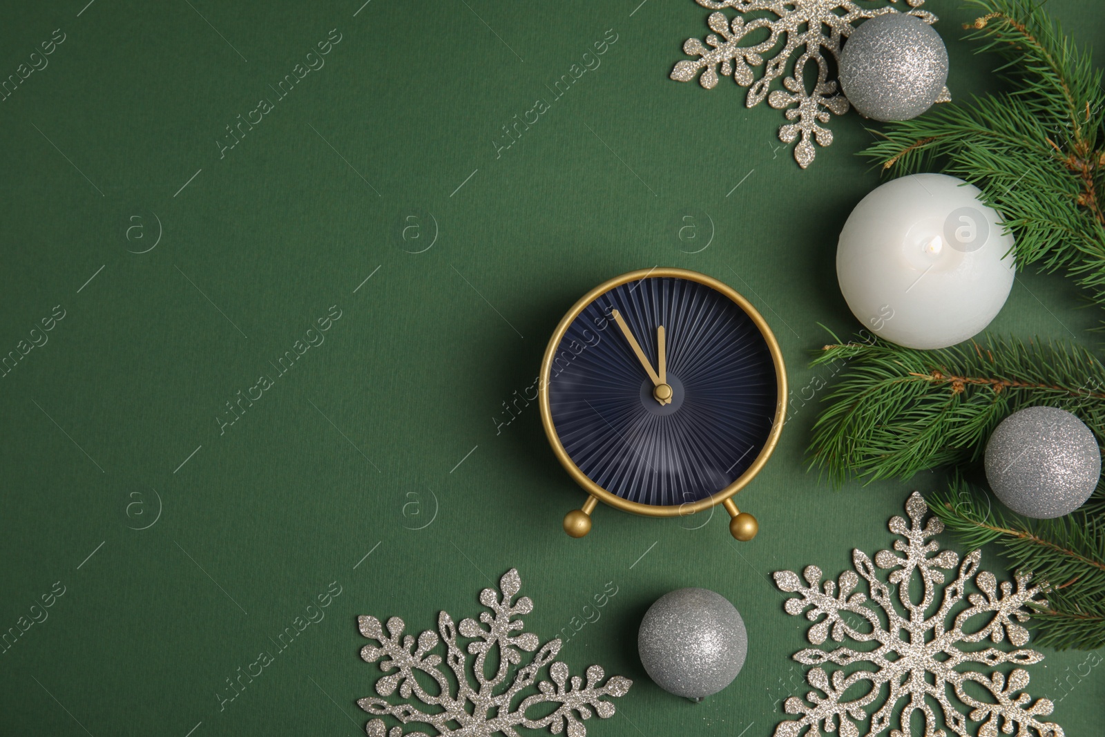 Photo of Flat lay composition with alarm clock and decorations on color background. Christmas countdown