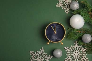 Flat lay composition with alarm clock and decorations on color background. Christmas countdown