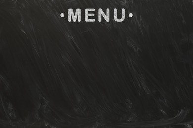 Image of Black chalkboard with word Menu as background. Mockup for design