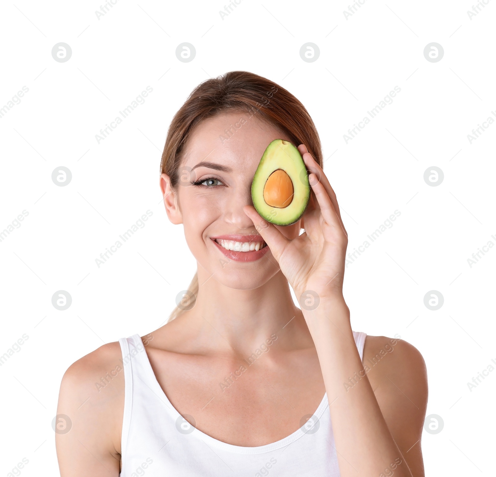 Photo of Portrait of young beautiful woman with ripe delicious avocado on white background