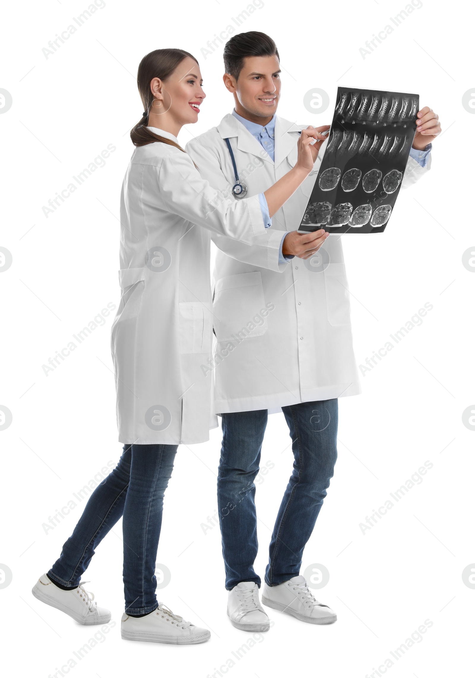 Photo of Orthopedists working with X-ray picture on white background